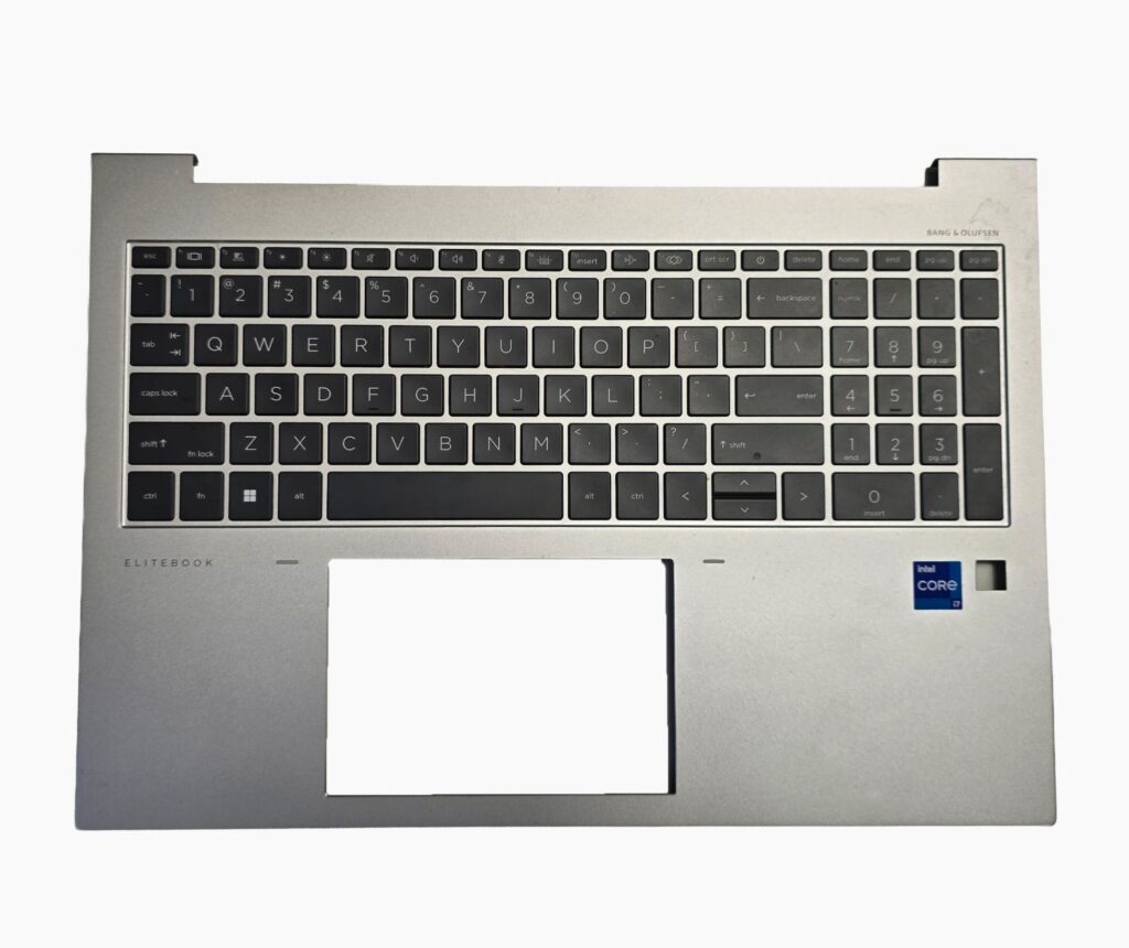 HP EliteBook palm rest assembly with the keyboard mounted in it, removed from the laptop